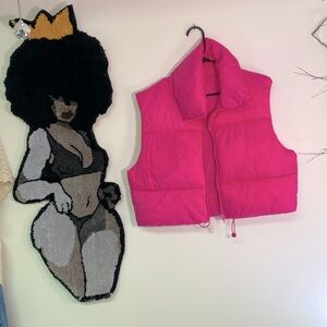 Cropped puffer vest with hat.